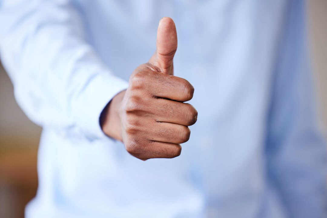 A person giving a thumb up.